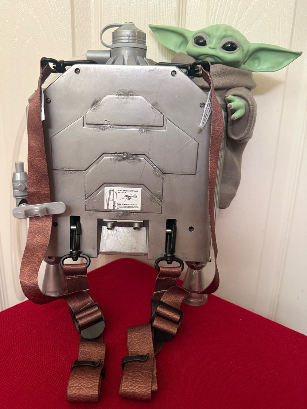 Grogu with Mandalorian jetpack sipper from Disneyland